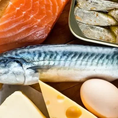 AdobeStock_382448032 A spread of fish, mushrooms, eggs and dairy products - key sources of vitamin D.