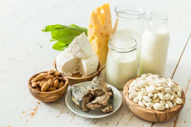 What is calcium An assortment of calcium-rich foods, including almonds, bony fish and dairy products.